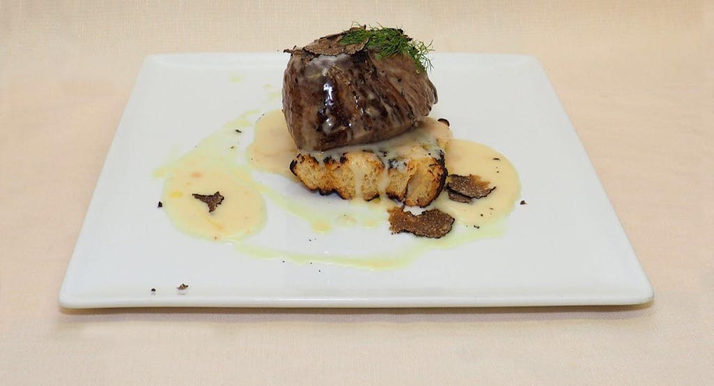 Tagliata di manzo con fonduta di pecorino e tartufo di San Miniato - Fonte: Quandoo