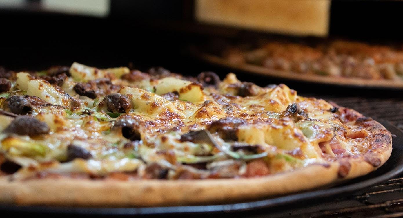 Photo of restaurant Minelli's Pizzeria & Cafe in Casula, Sydney